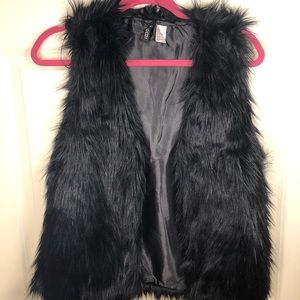 Black faux fur vest